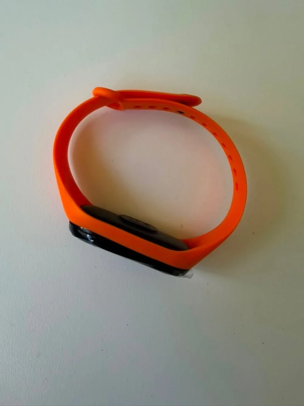 Replaceable Orange Silicone Smartwatch Band with Black Tracker Module